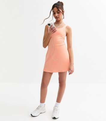 Girls Coral Pink Athleisure Split Hem Mini Dress