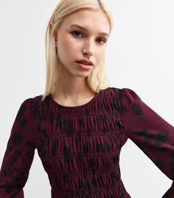 Burgundy Printed Shirred Peplum Hem Top