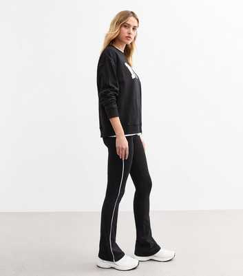 Black Contrast Piping Kickflare Leggings