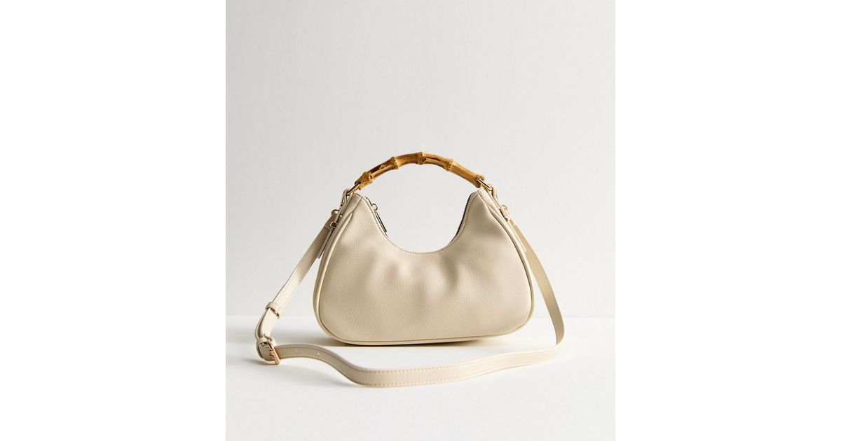 Cream Faux Leather Bamboo Handle Crossbody Bag New Look