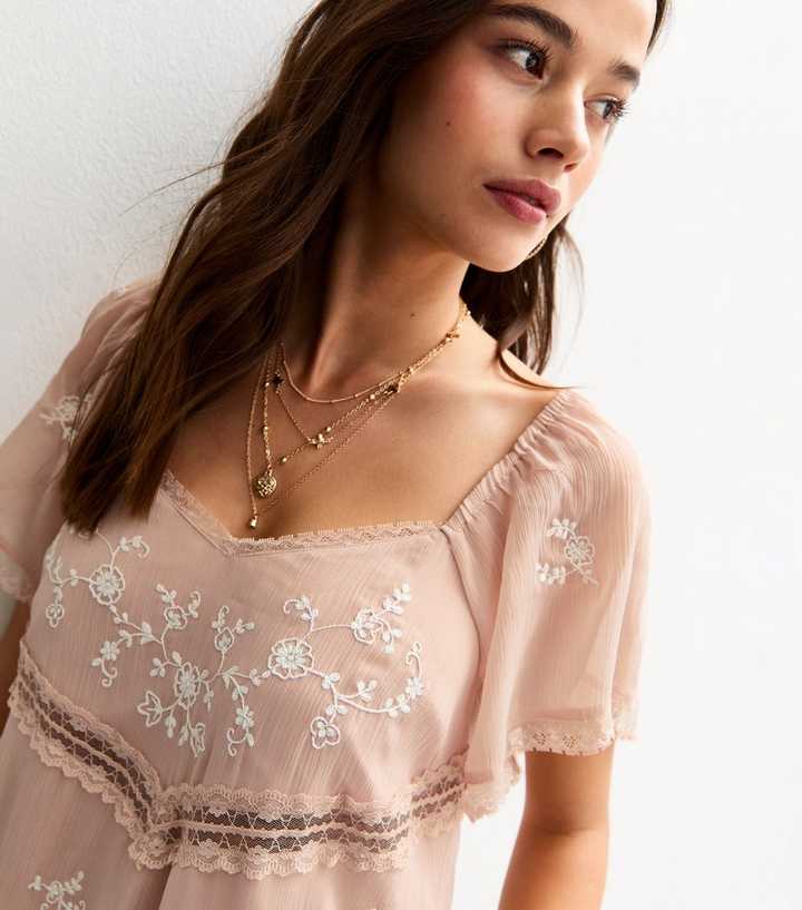 Light Pink Embroidered Lace Frill Sleeve Ruffle Mini Dress | New Look Light Pink Embroidered Lace Frill Sleeve Ruffle Mini Dress | New Look