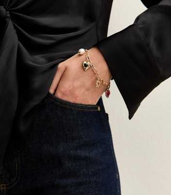 Gold Tone Multi Charm Bracelet 