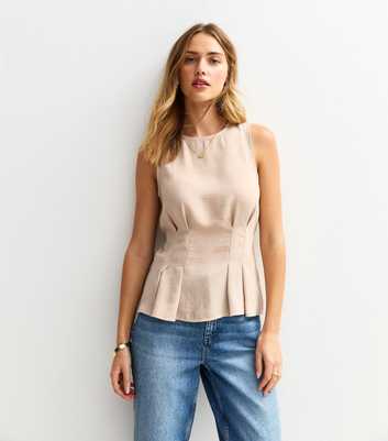 Stone Pleated Waist Peplum Top