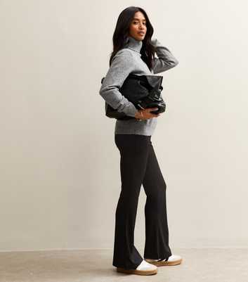 Petite Black Ribbed Flared Trousers