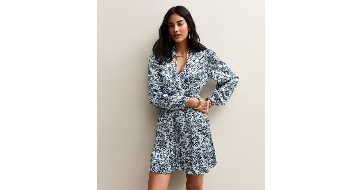 Diana | Dark Blue Paisley Print V-Neck Mini Dress main image 1