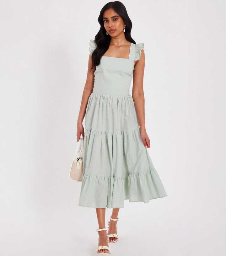 deep cut v neck dresses Celine Crepe V-Neck Gown- Ivory 12 YE024 or a sophisticated high BOSS cap-toe Derby Shoes Color:Camel/Black Plaid