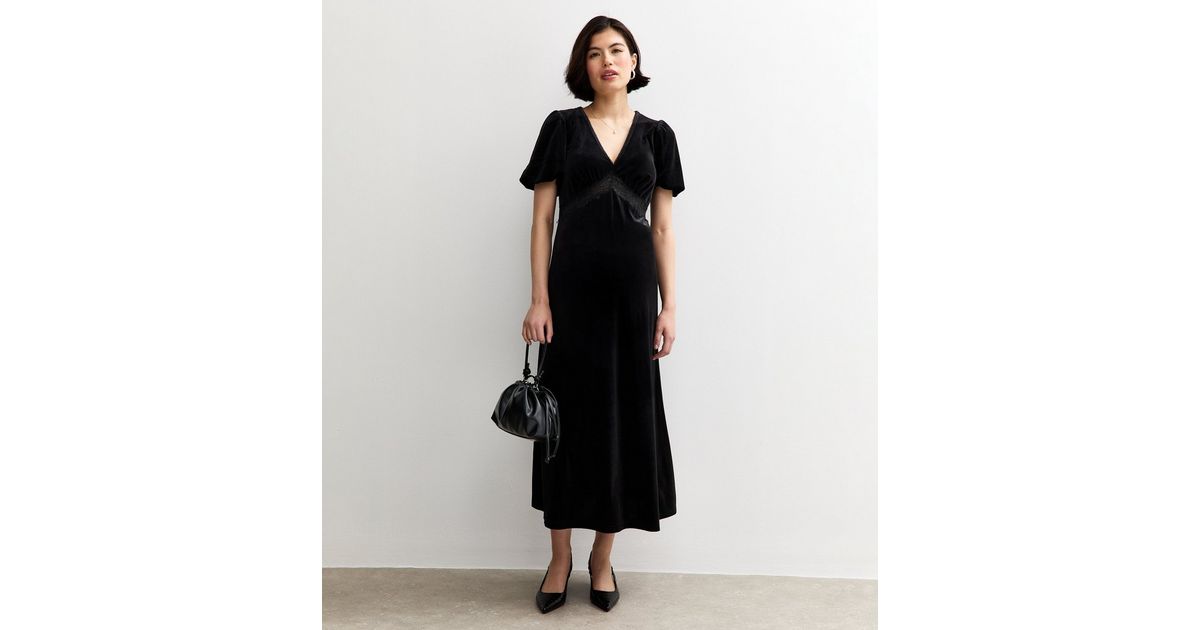 black cocktail dress petite Mac Duggal Petite Polka Dot Net Bustier A-Line Midi Dress main image 1