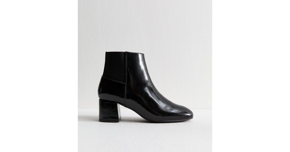 ANKLE BOOTS IN BLACK PATENT CALFSKIN main image 1