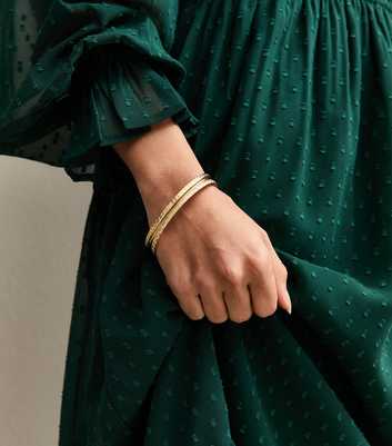 Gold Tone Pack of 4 Skinny Bangles