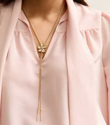 Gold Tone Textured Flower Long Toggle Necklace
