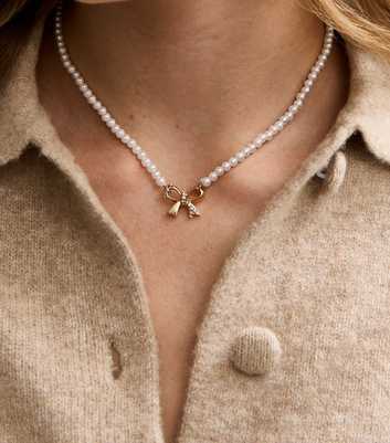 Gold Tone Faux Pearl Diamante Bow Necklace