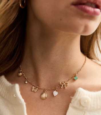 Gold Tone Mixed Charm Necklace