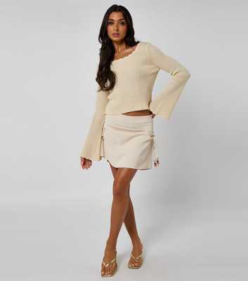 Urban Bliss Cream Draped Mini Skirt