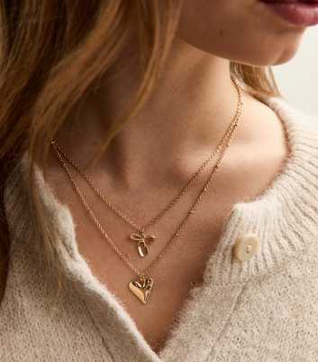 Gold Tone 2 Layer Bow and Heart Pendant Necklace