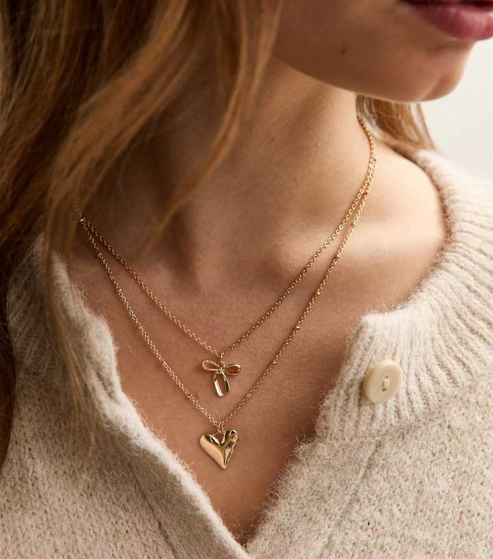 Gold Tone 2 Layer Bow and Heart Pendant Necklace