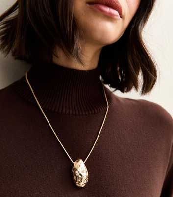 Gold Tone Beaten Dome Long Necklace
