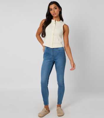 Urban Bliss Cream Sleeveless Button Front Top