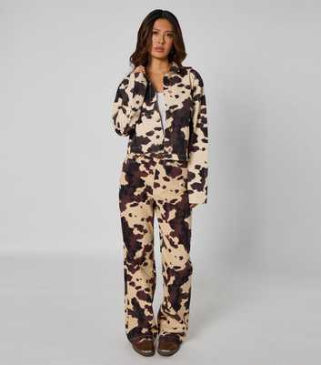 Urban Bliss Brown Cow Print Wide Leg Jeans