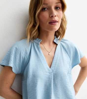 Blue Crinkled Flutter Sleeve Blouse