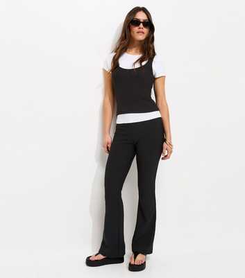Petite Black Rib Flared Trousers
