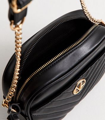 Black Faux Leather Quilted Front Pocket Crossbody Bag | New Look