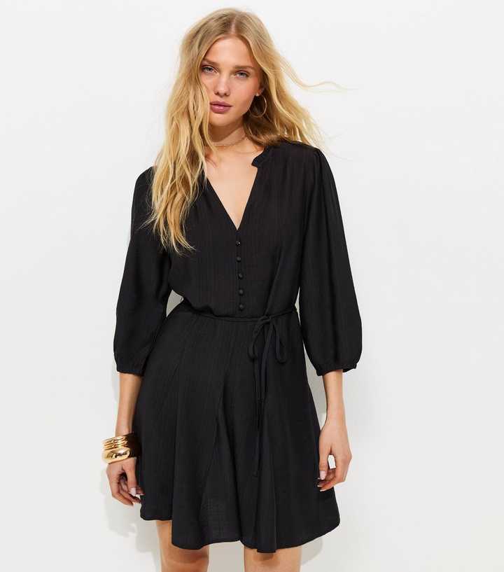short black flowy dress with sleeves Wild Iris Flowy Black Mini Dress with Bell Sleeves
