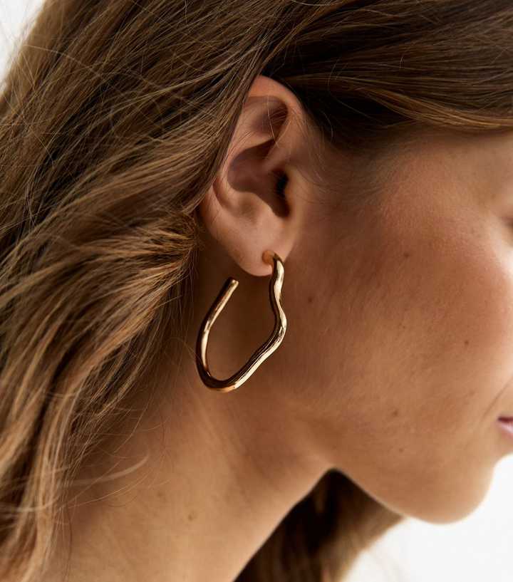 Gold Tone Skinny Sculptural Hoop Earrings