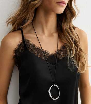 Silver Tone Oval Pendant Rope Necklace