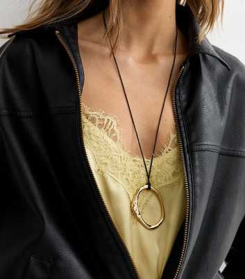 Gold Tone Oval Pendant Rope Necklace