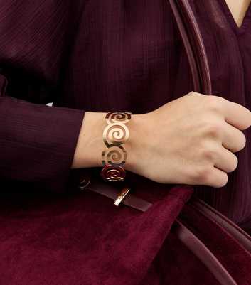 Gold Tone Swirl Shaped Cuff Bracelet