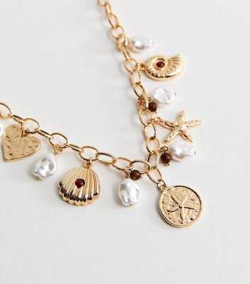 Gold Tone Heart Pearl Shell Charm Necklace