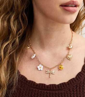 Gold Tone Flower Charm Necklace