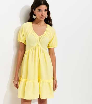 Light Yellow Textured Tiered Mini Smock Dress