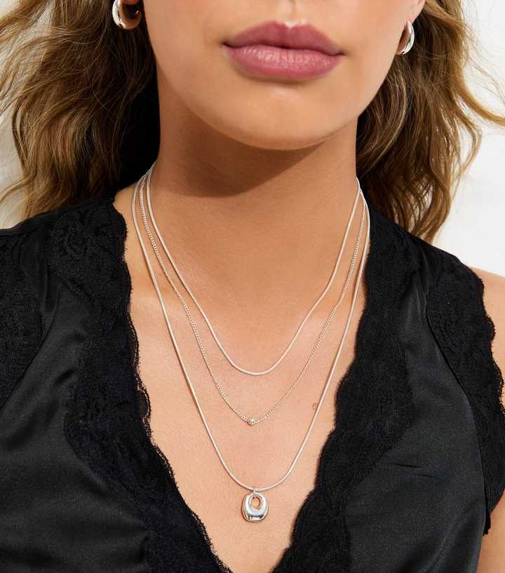 Silver Tone Triple Layer Oval Pendant Necklace