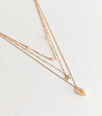 Gold Tone Triple Layer Starfish and Shell Pendant Necklace