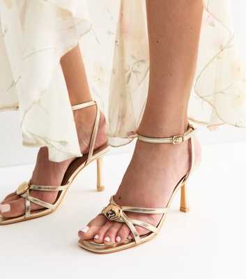 Gold Faux Leather Sculpted Charm Detail Strappy Sandals