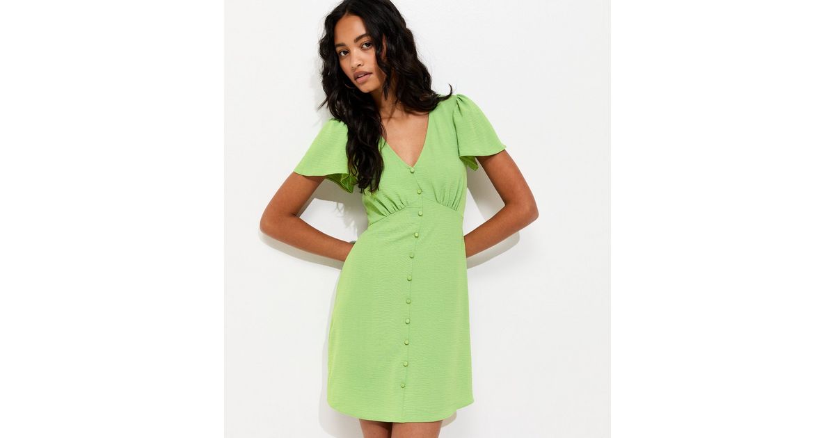new look green tea dress New Look Ditsy Floral Mesh Midi Tea Dress in Green