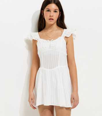 Girls White Textured Flutter Sleeve Dress