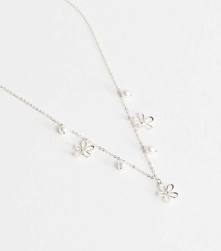 Silver Tone Cutout Flower Charm Necklace