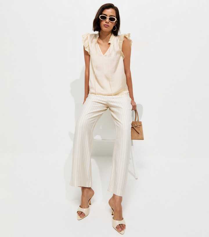 Cream Frilly Cap Sleeve Tie Neck Top