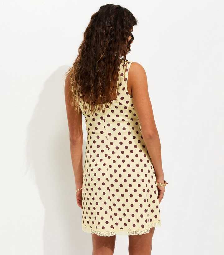 Light Yellow Crinkled Polka Dot Sleeveless Mini Dress | New Look