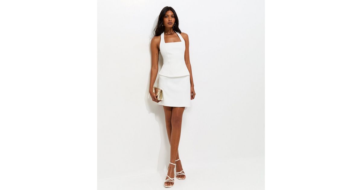 Off White Halterneck Peplum Mini Dress | New Look Off White Halterneck Peplum Mini Dress | New Look