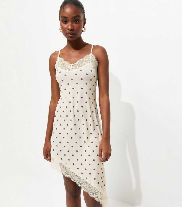 White Polka Dot Asymmetric Hem Mini Dress | New Look
