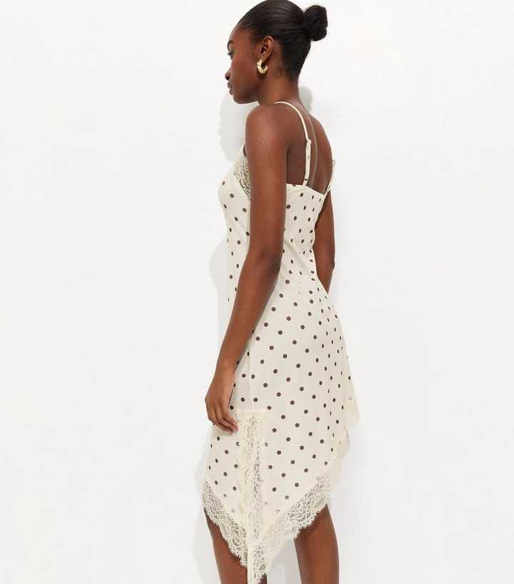 White Polka Dot Asymmetric Hem Mini Dress | New Look White Polka Dot Asymmetric Hem Mini Dress | New Look