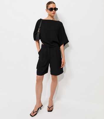 Black Slash Neck Textured Batwing Top