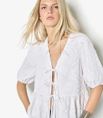 Apricot White Textured Tie Front Peplum Top