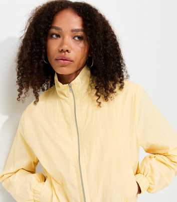 Light Yellow Bubble Hem Zip Lightweight Jacket