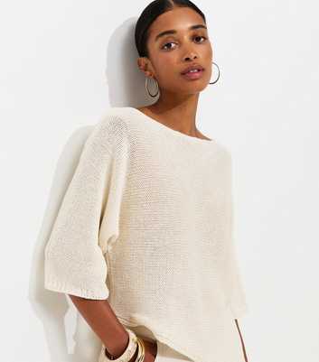 Off White Open Knit Asymmetric Hem Slash Neck Top
