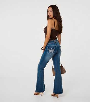 Pink Vanilla Blue Embroidered Butterfly Pocket Flared Jeans