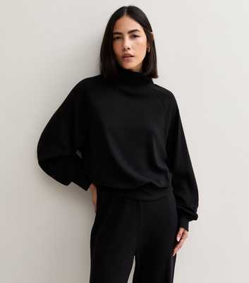 Black Soft Touch Stand Neck Batwing Sleeve Top